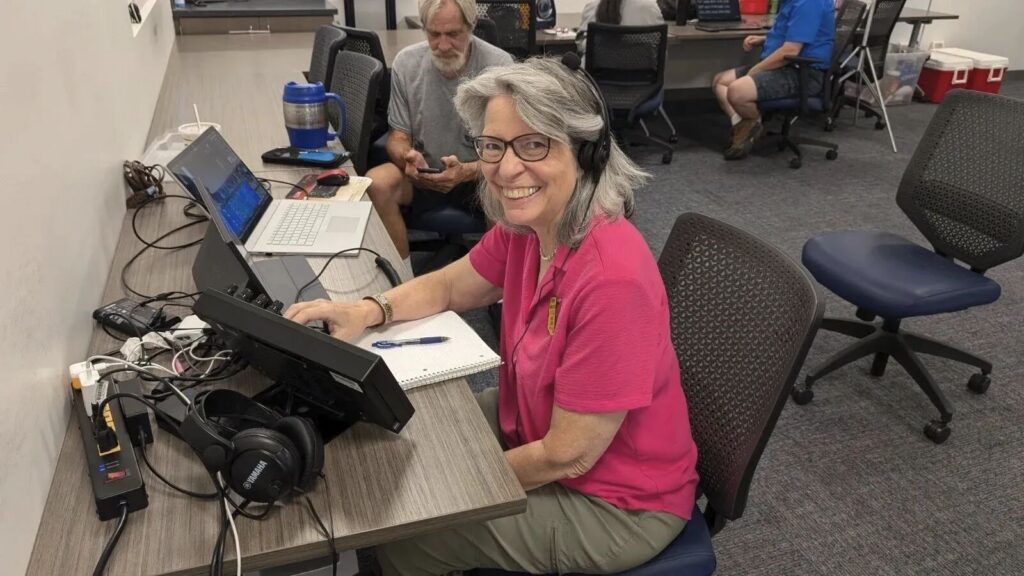 Krissy operating amateur radio at a WVARC event