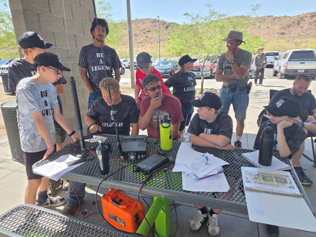 Adam N7XAK helping Scouts learn about amateur radio