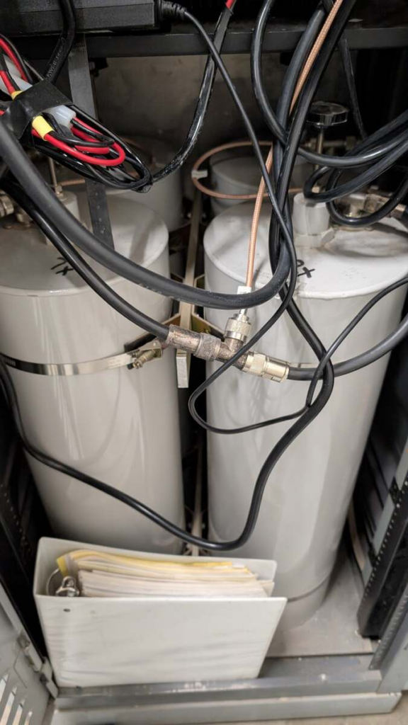 Cavity duplexers and coax cabling in the NY7S repeater equipment rack