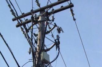 Utility pole and electrical distribution lines, illustrating a potential source of radio frequency interference.